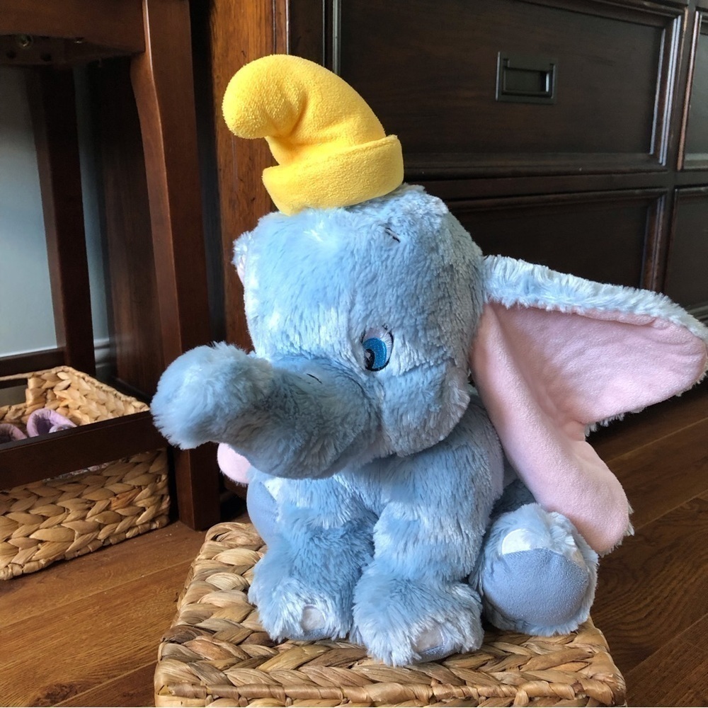 Disney: Classic Dumbo stuffed figure.